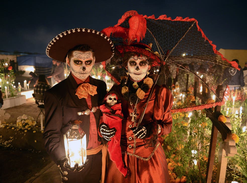 A couple celebrate Mexico’s Day of the Dead holiday