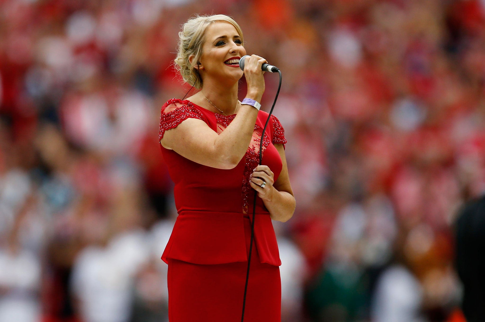 Lizzie Jones, widow of rugby player Danny Jones, performs 'Abide With Me' at Wembley Stadium