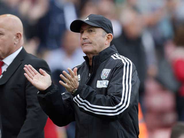Tony Pulis applauds the Stoke fans during Saturday's victory over West Brom
