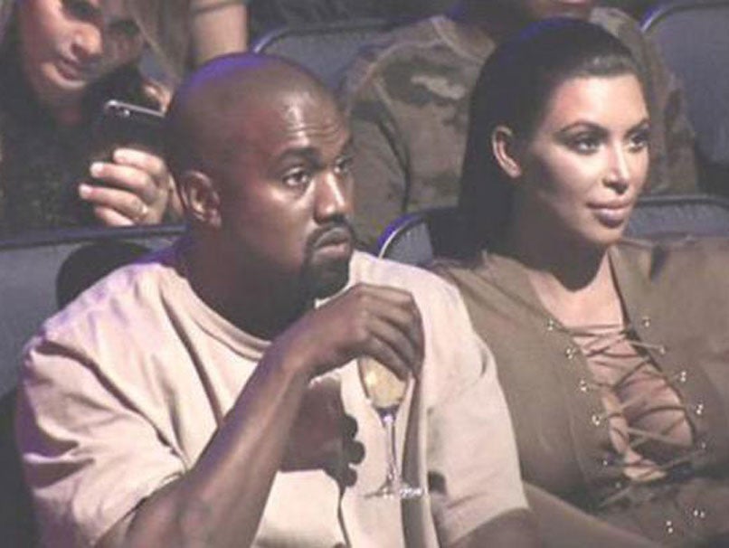 Kanye West looking unimpressed at Mackelmore's performance at the MTV VMAs 2015