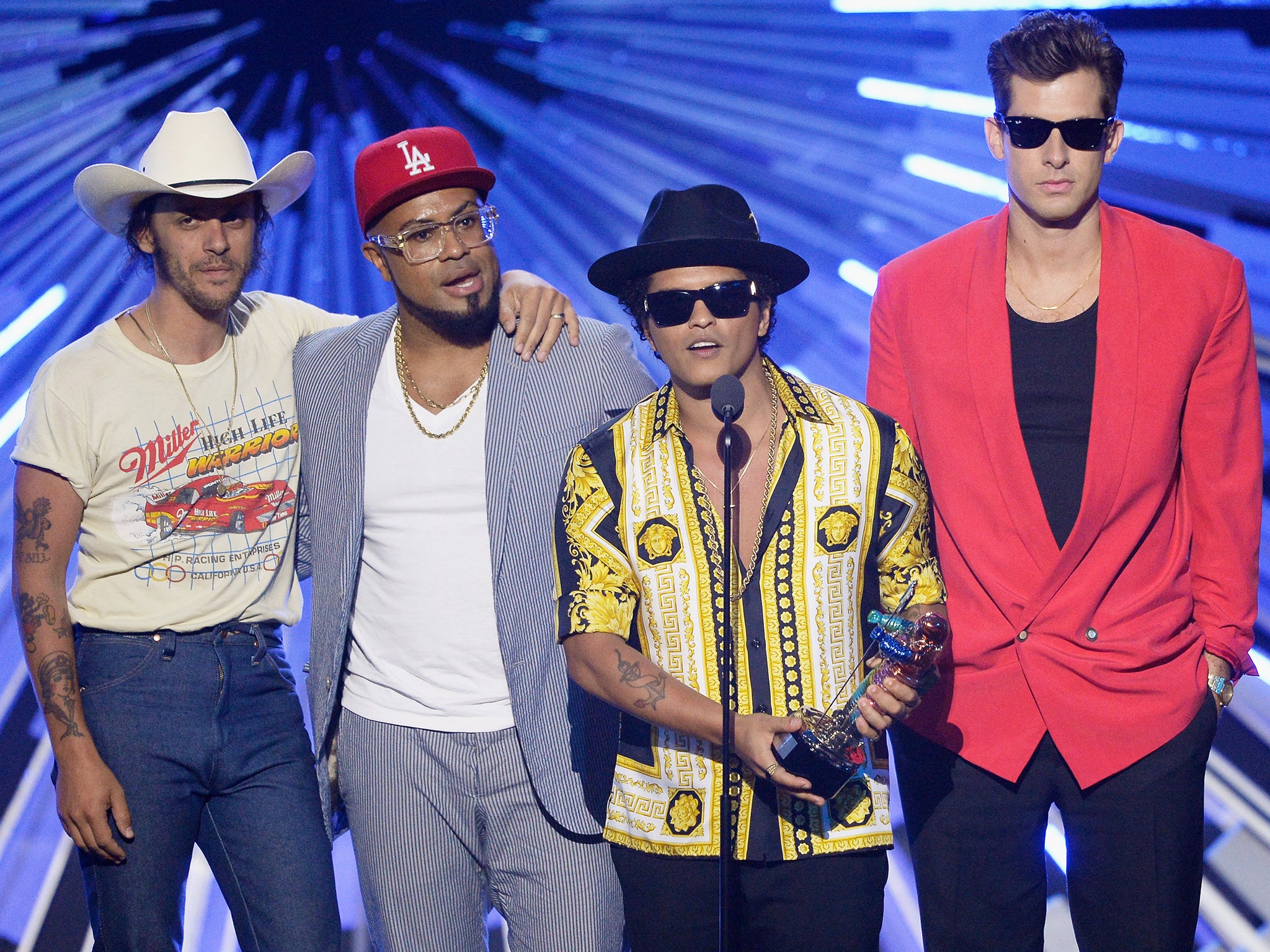 Uptown Funk, by Mark Ronson (right) now has 11 credited songwriters after artists demonstrated that the hit incorporated samples from them