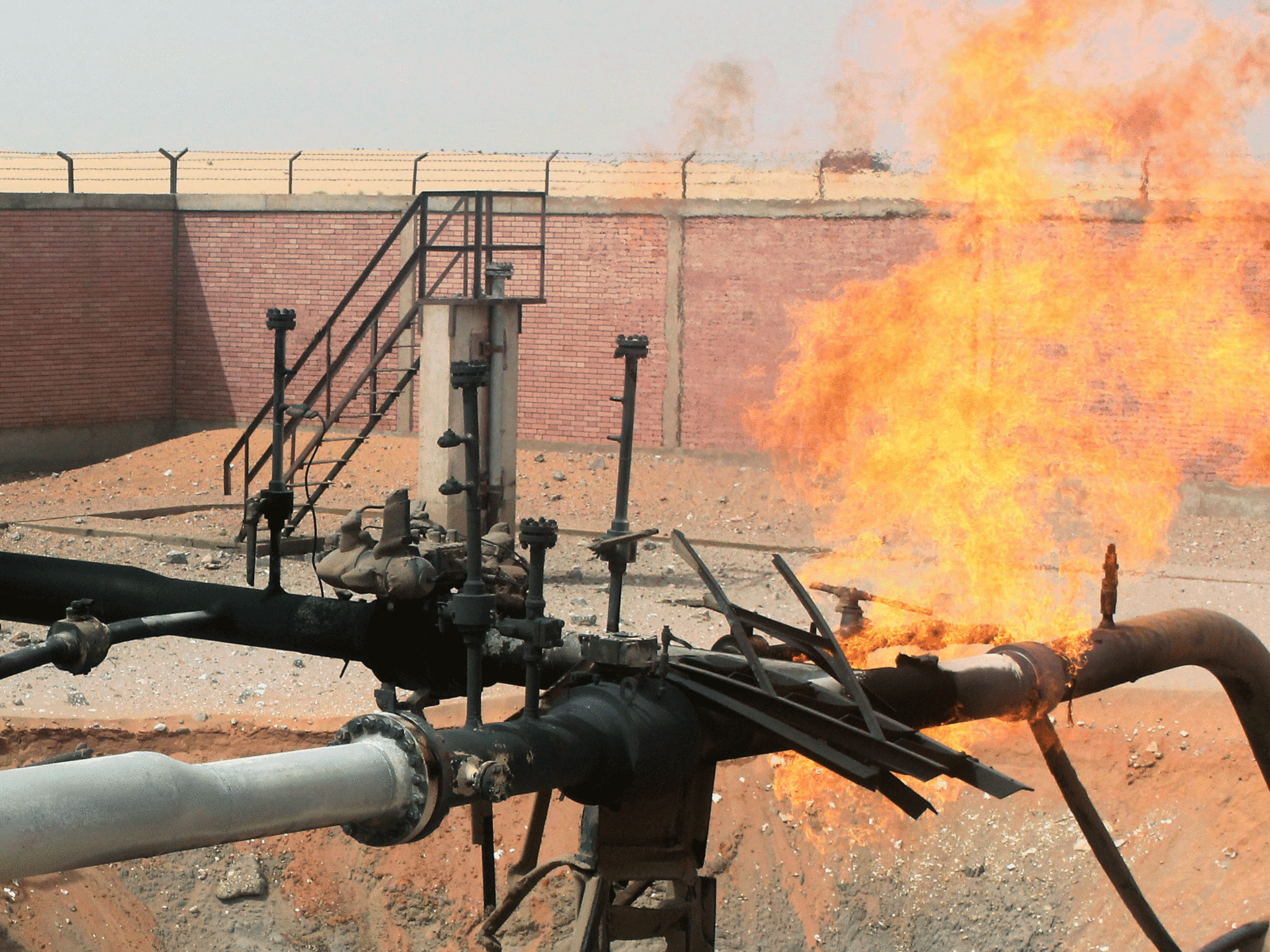 Flames rise from an Egyptian gas pipeline after it was bombed by saboteurs in 2011