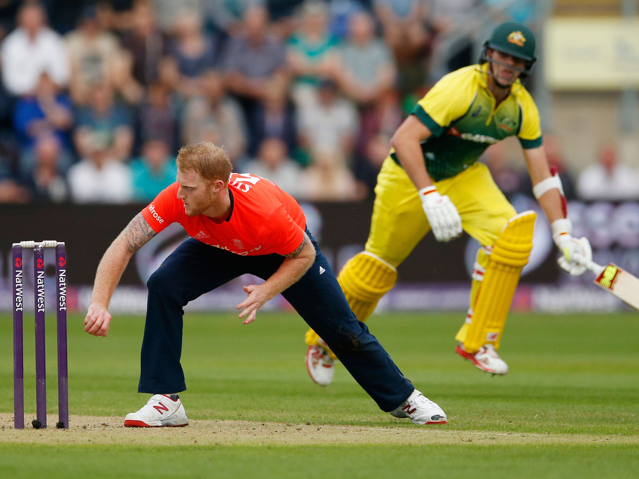 England's Ben Stokes runs out Australia's Pat Cummins