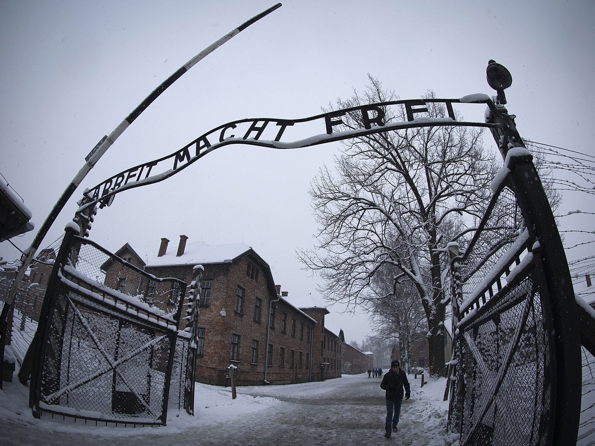Auschwitz caretakers defend use of misting hoses at former concentration camp