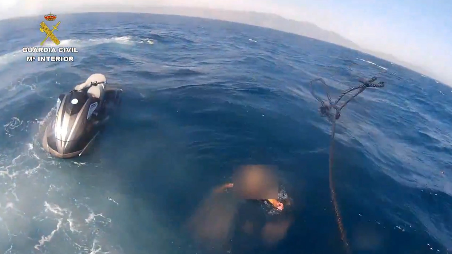 Spanish police arrest 15 men for smuggling migrants on the back of jet-skis near Marbella