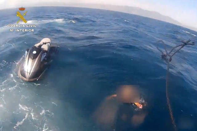 Spanish police arrest 15 men for smuggling migrants on the back of jet-skis near Marbella
