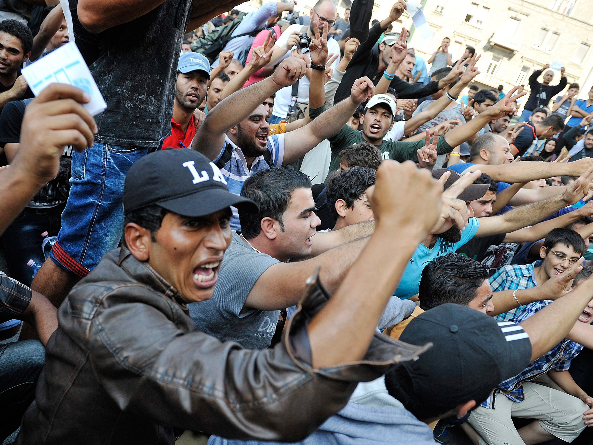 Migrants protest in front of the Keleti Railway Station