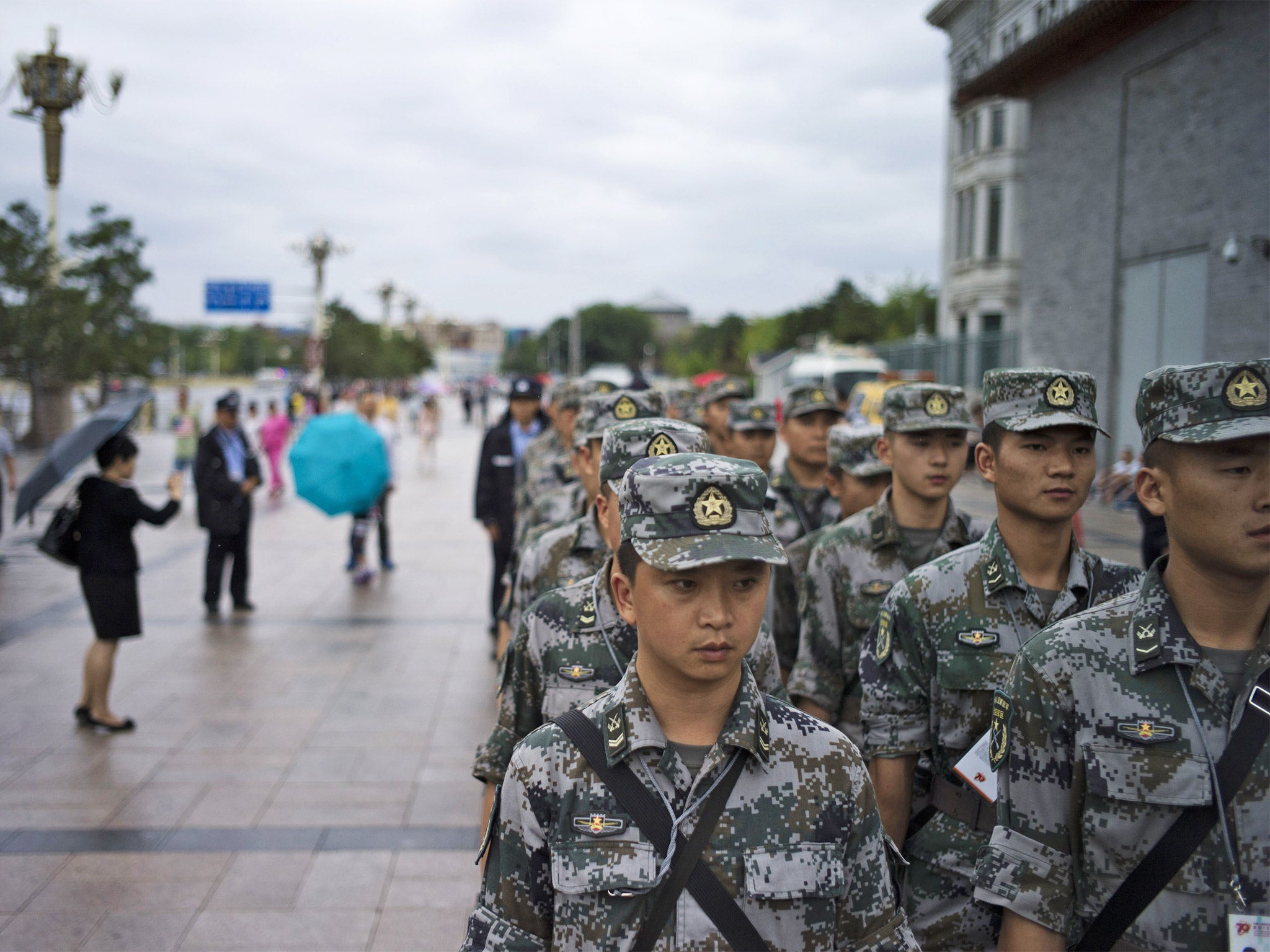 Chinese soldiers in Tiananmen Square before a parade to mark ‘victory’ over Japan (Getty)