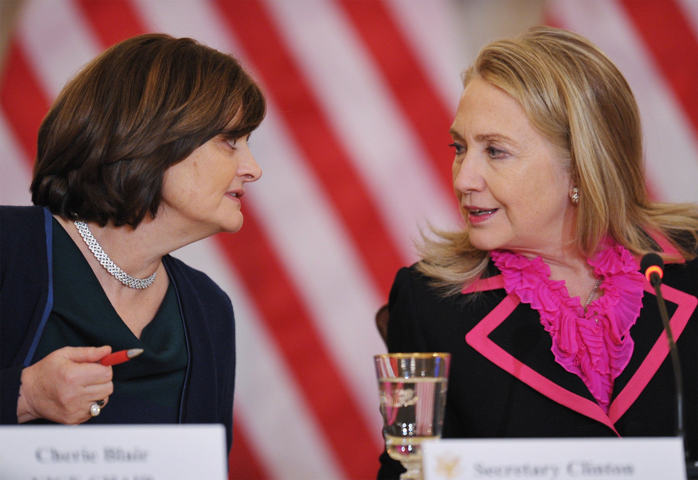 Cherie Blair talks to Hillary Clinton, who was then the US Secretary of State, in Washington in 2012