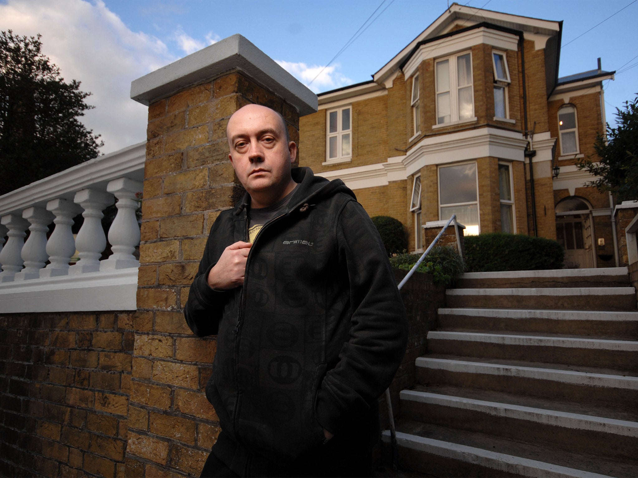 Simon Cooke outside Waxham House care home on the Isle of Wight, where staff left his mother sitting in her own waste for hours and failed to treat bedsores which turned septic