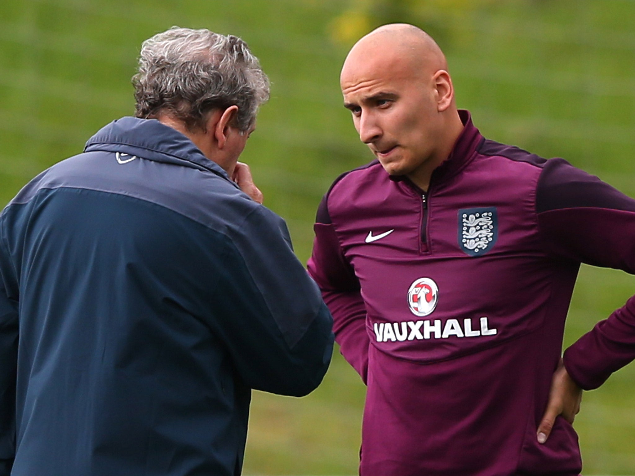 England Manager Roy Hodgson speaks with Jonjo Shelvey at St Georges Park on Wednesday