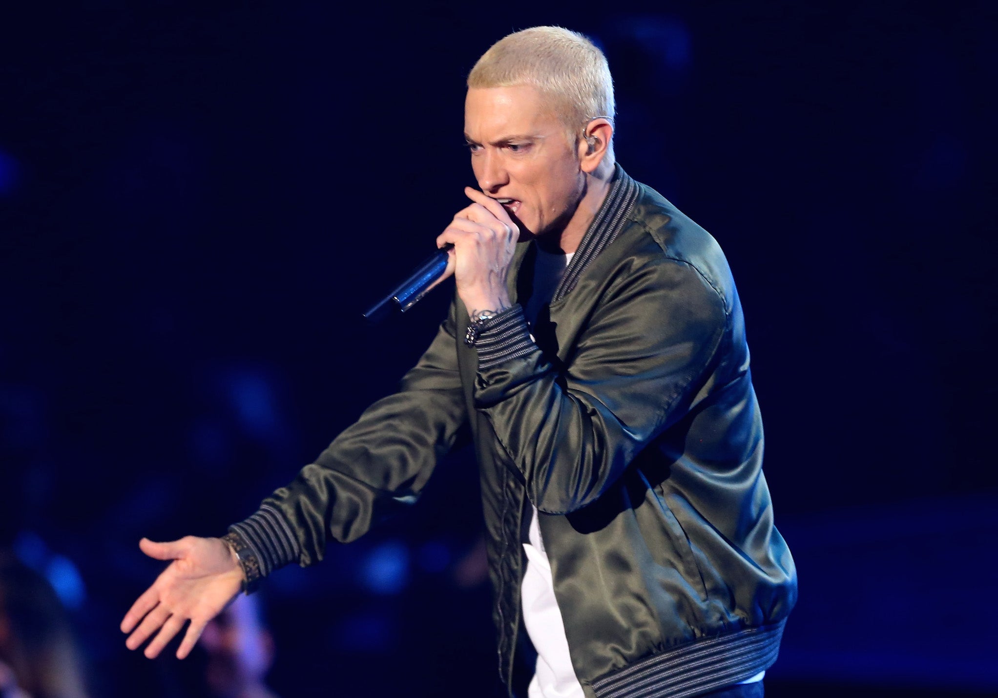Eminem performs onstage at the 2014 MTV Movie Awards in Los Angeles.