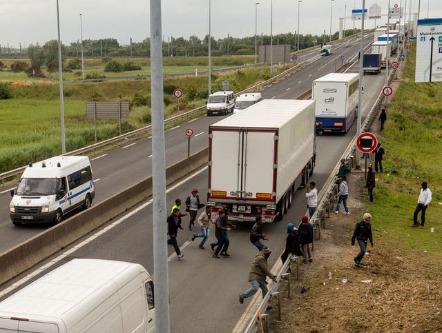 The scene in Calais this summer as migrants sought a route to the UK