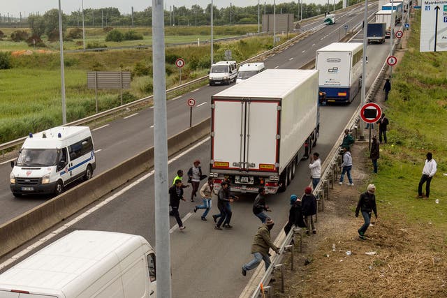 The scene in Calais this summer as migrants sought a route to the UK