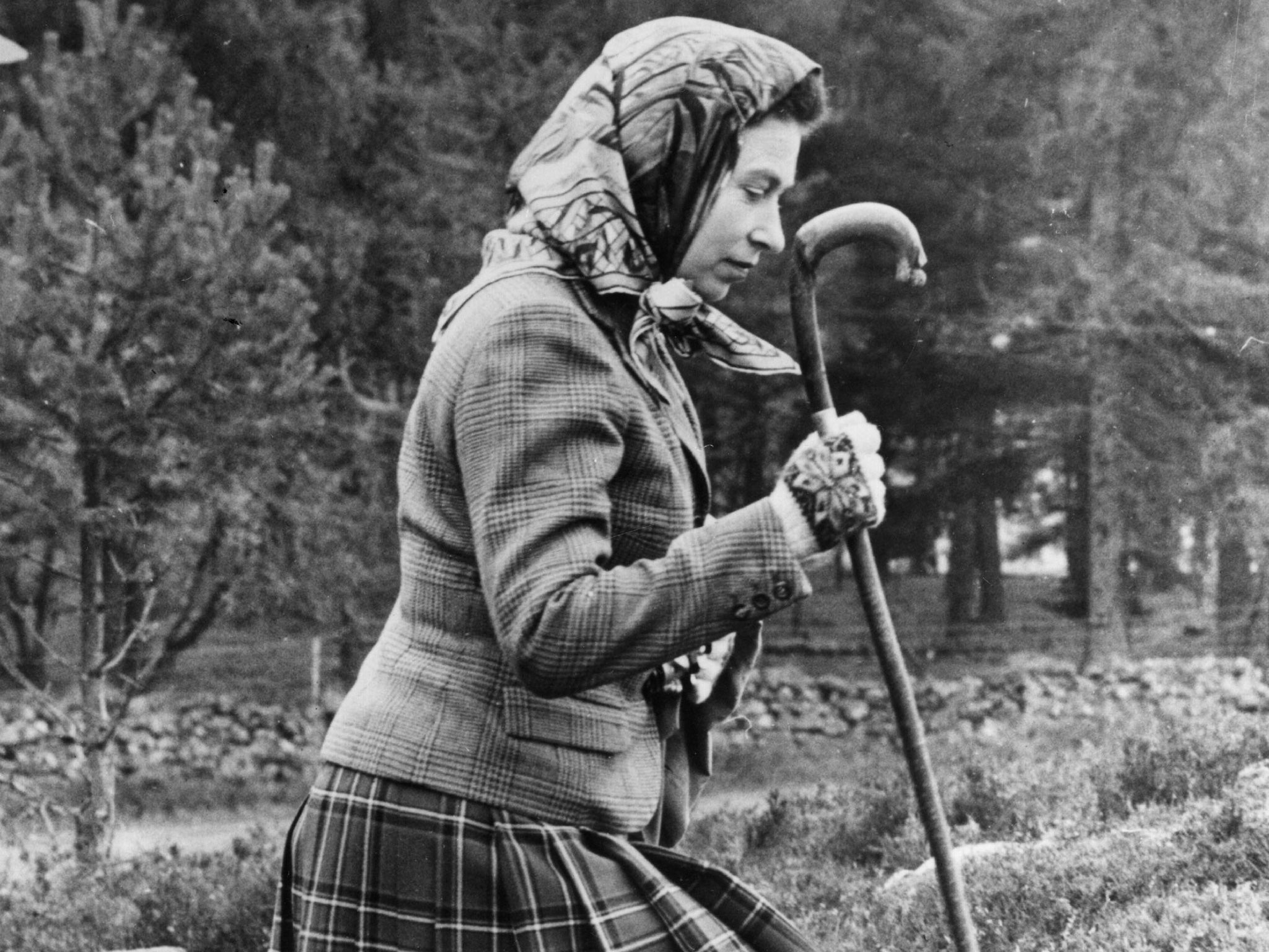 Queen Elizabeth II walking cross country at the North of Scotland Gun Dog Association Open Stake Retriever Trials in the grounds of Balmoral Castle in 1967