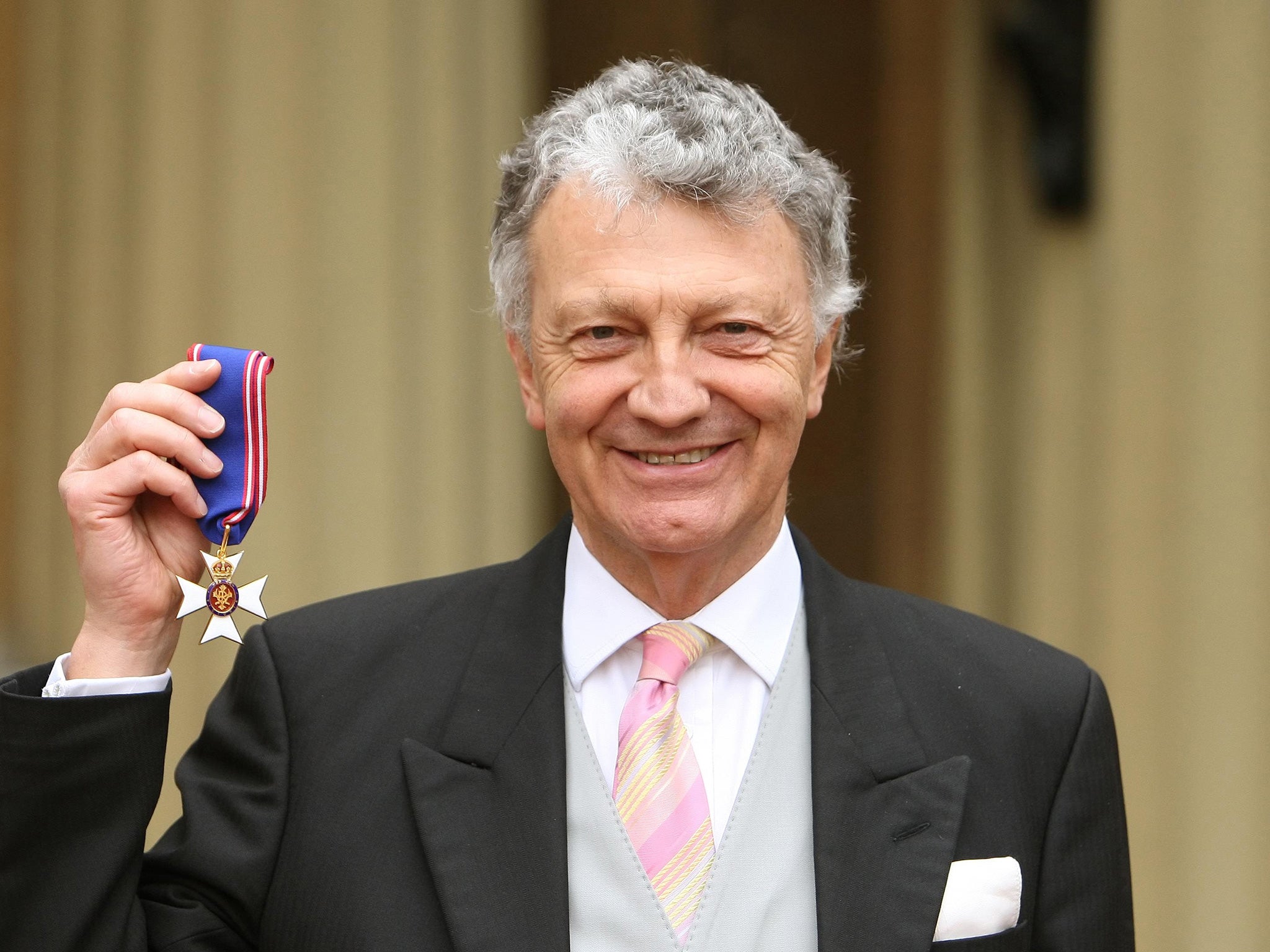 William Shawcross with his Commander of the Royal Victorian Order (RVO) medal