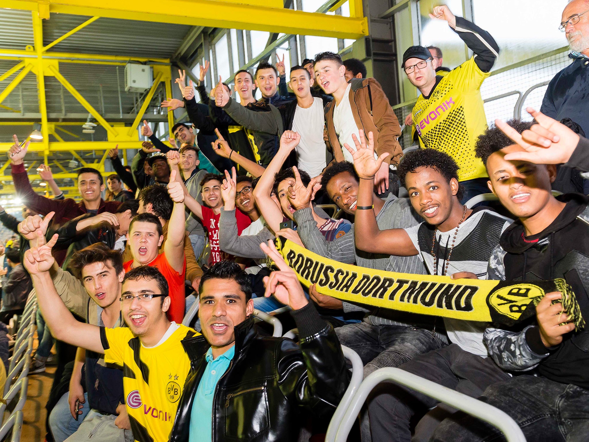 Hundreds of refugees were recently invited to a Borussia Dortmund match against Odds