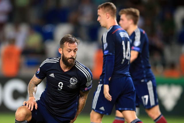 Steven Fletcher (left) is down and frustrated as Scotland fail to mount a threat to Georgia in Tbilisi