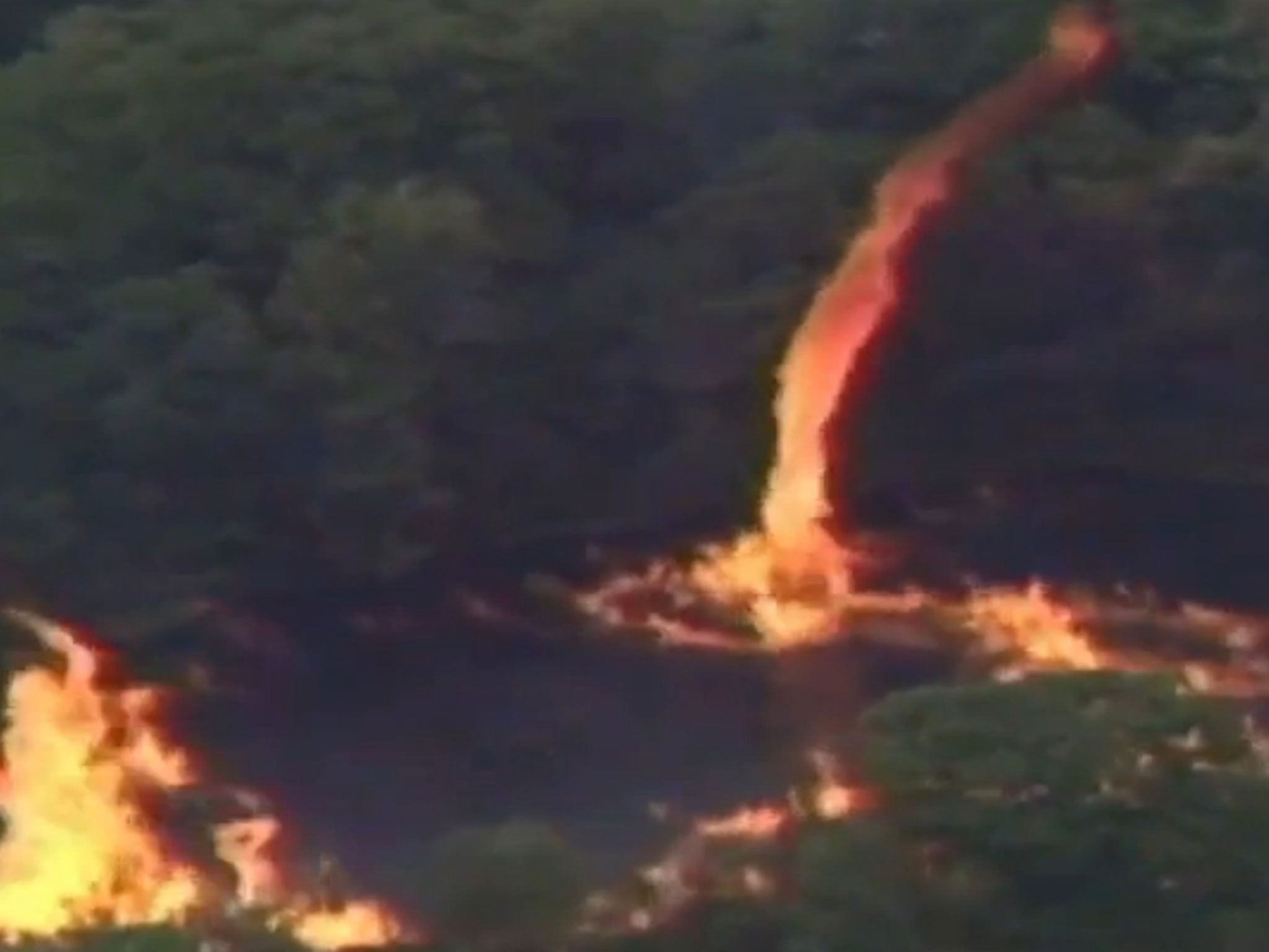 The flames gathered on the surface of a nearby creek