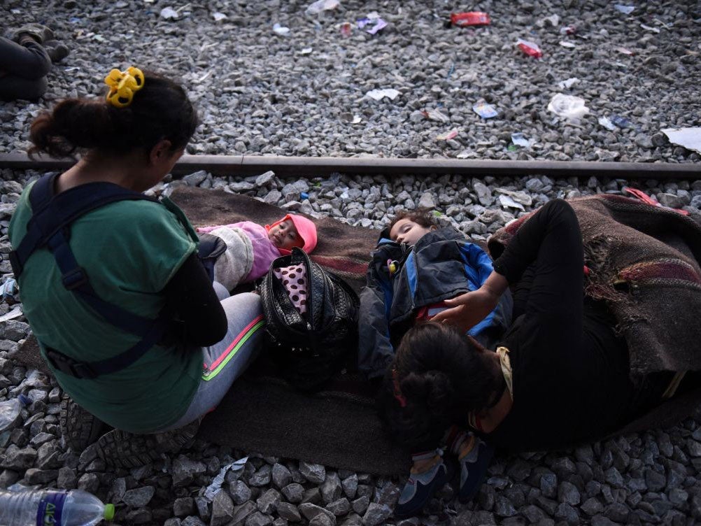 Children on the railway tracks at the border between Greece and Macedonia