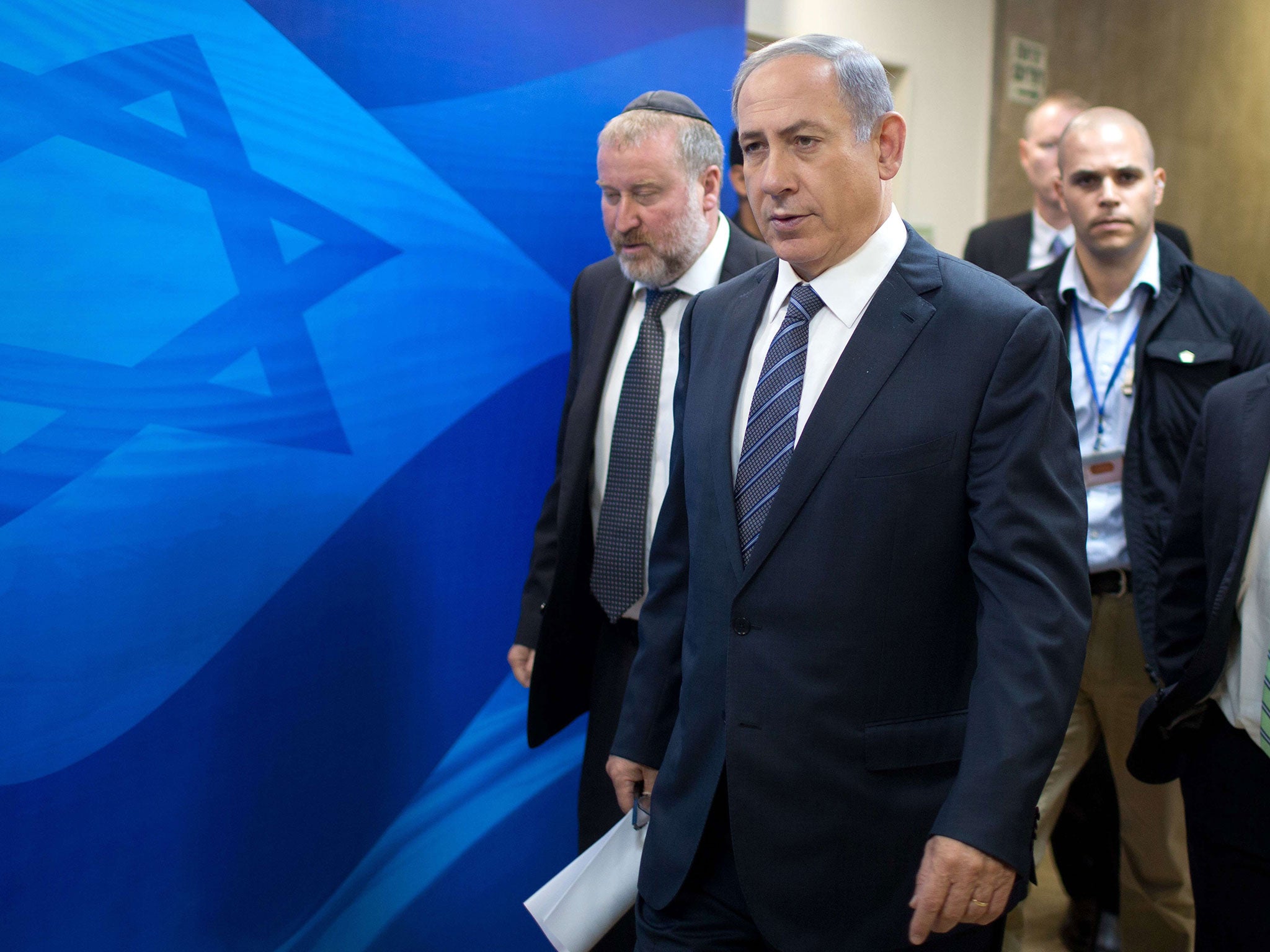 Israeli Prime Minister Benjamin Netanyahu arrives for the weekly cabinet meeting at his office in Jerusalem on September 6, 2015