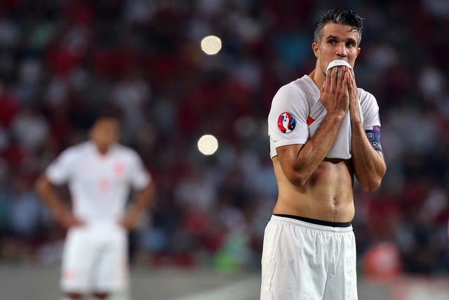 Robin van Persie, the Netherlands captain, looks forlorn at the end of their 3-0 defeat to Turkey