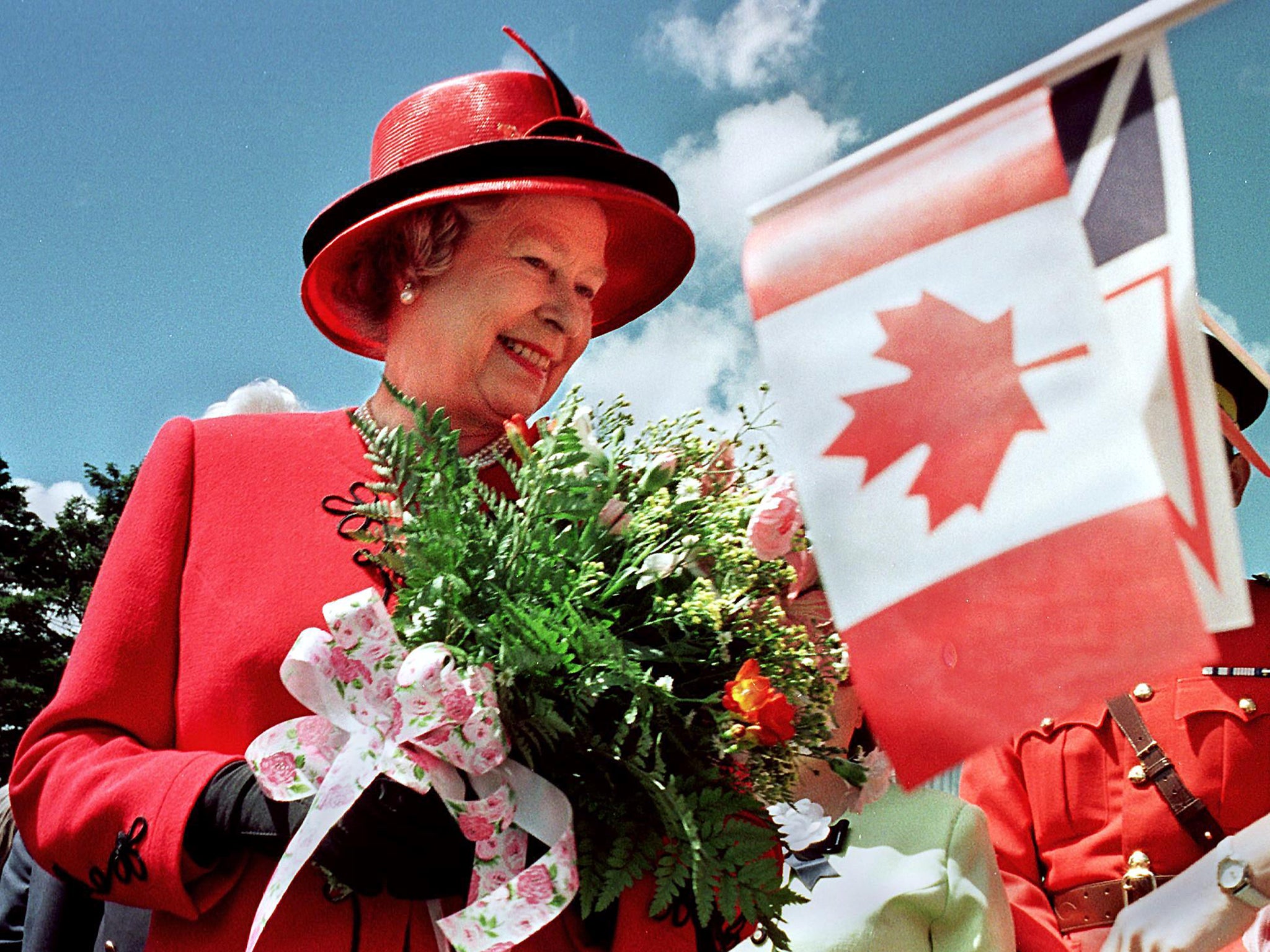 Queen Elizabeth II smiles as she visits Bowring Park in St John's, Newfoundland, on the third day of a 10-day official visit to Canada, 1997