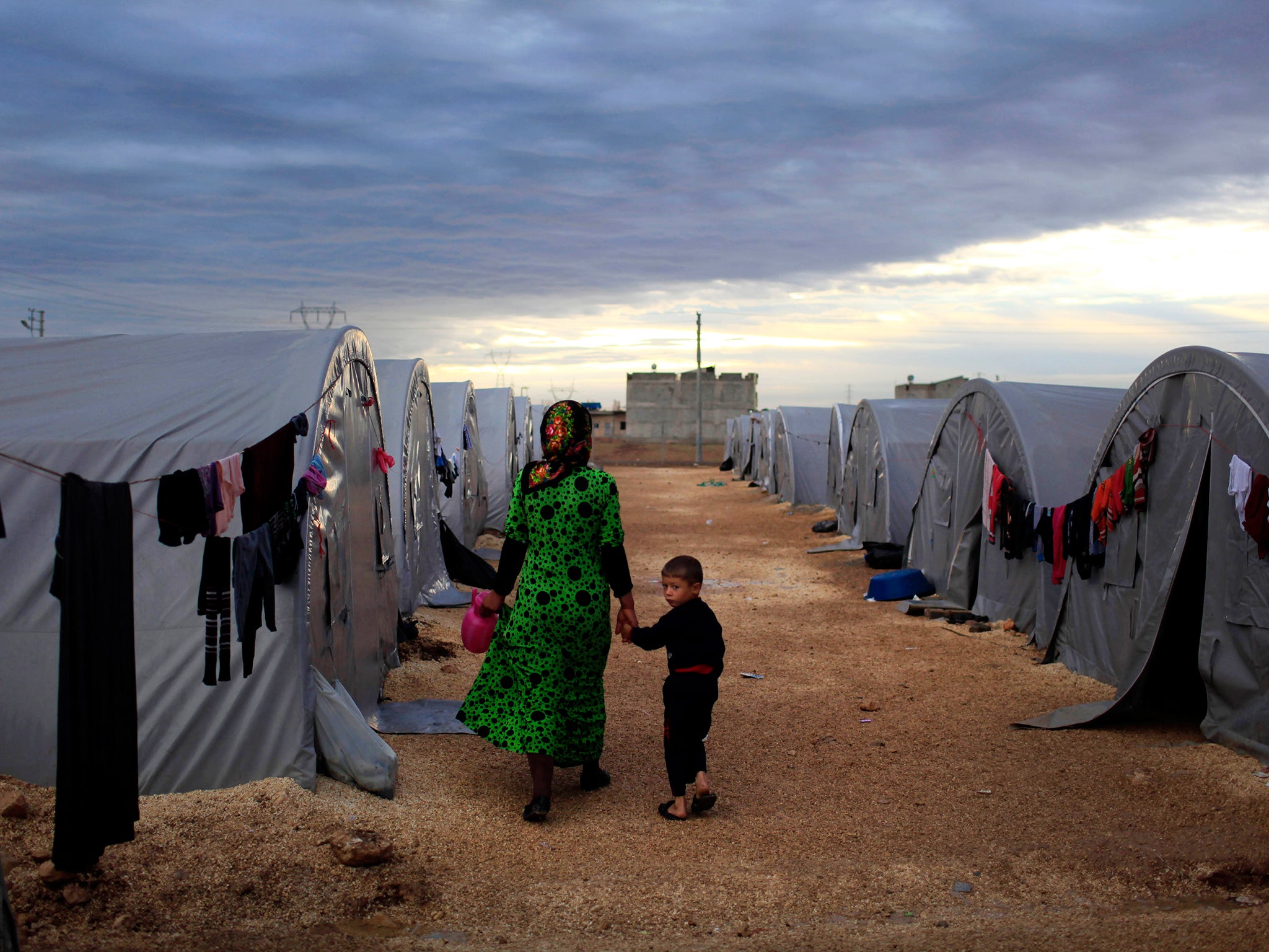 Syrian refugees are pictured at a camp