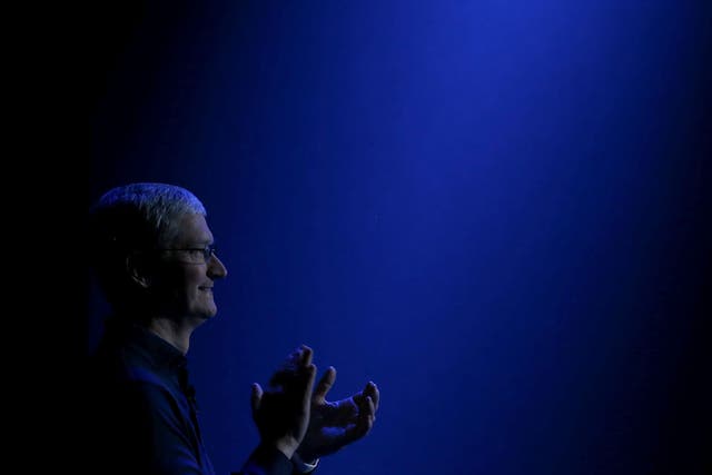 Apple CEO Tim Cook looks on as he delivers the keynote address during Apple WWDC on June 8, 2015 in San Francisco, California