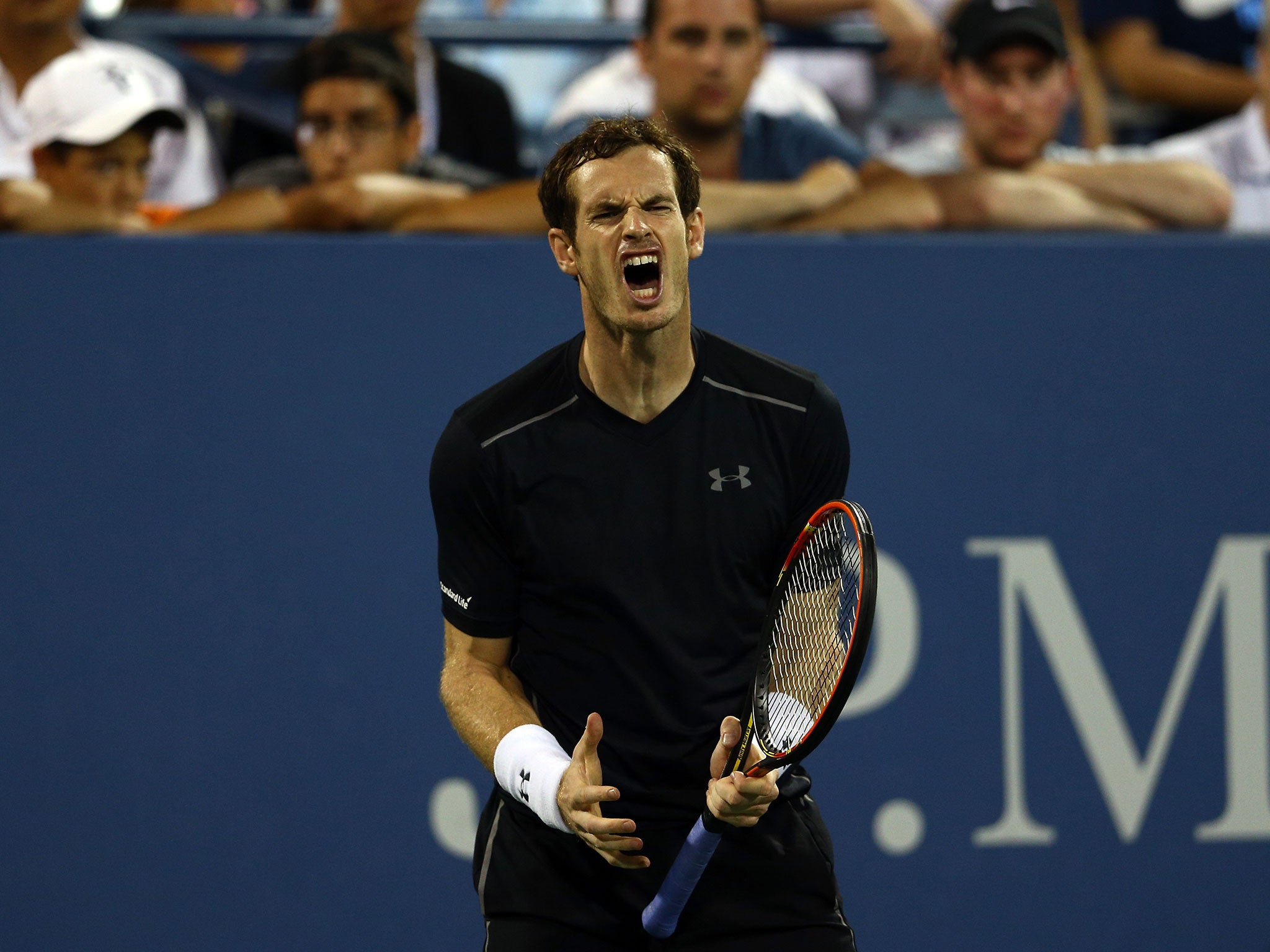 Andy Murray shouts in anger after losing a point to Kevin Anderson