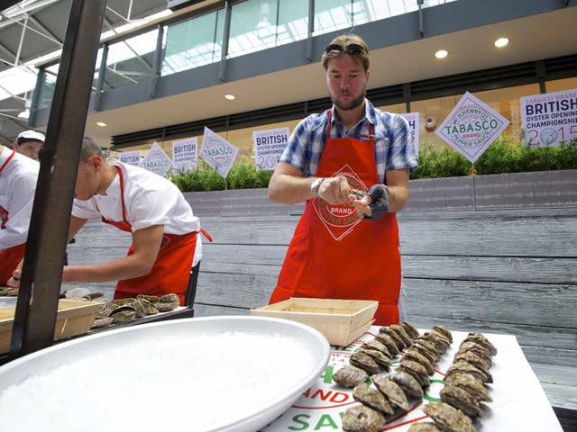 Contest winner Fredrik Lindfors at work. Oysters must be presented with briny flesh