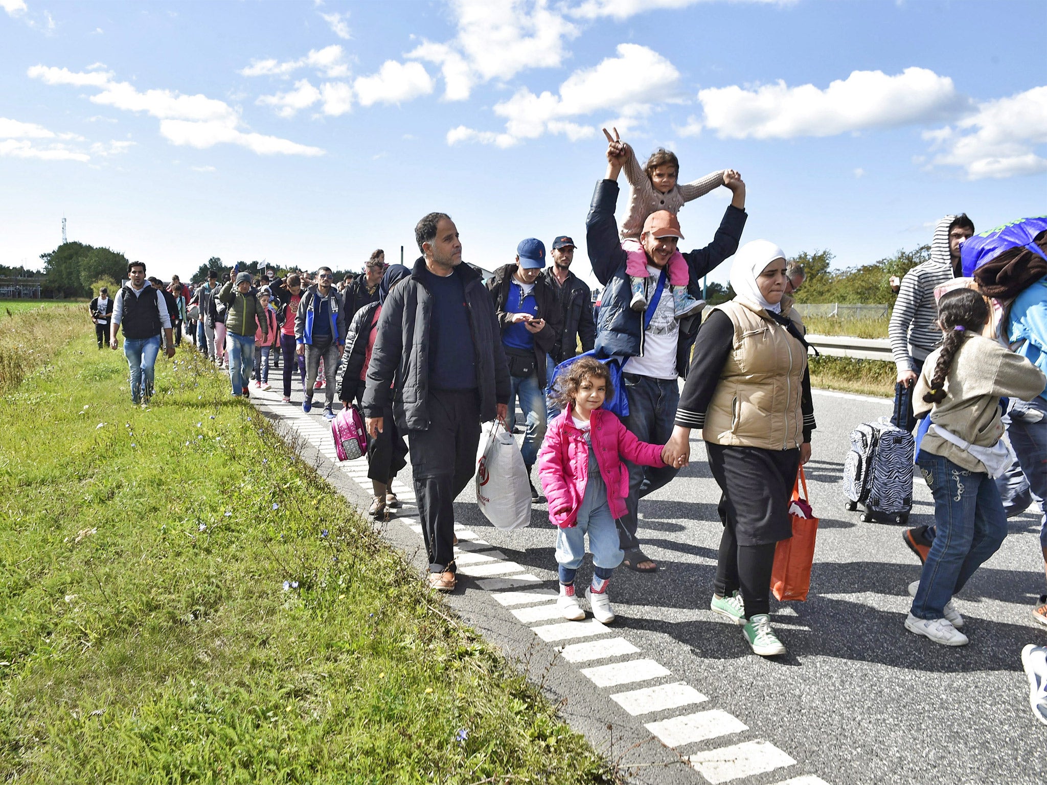 Refugees in Denmark on their way to Sweden