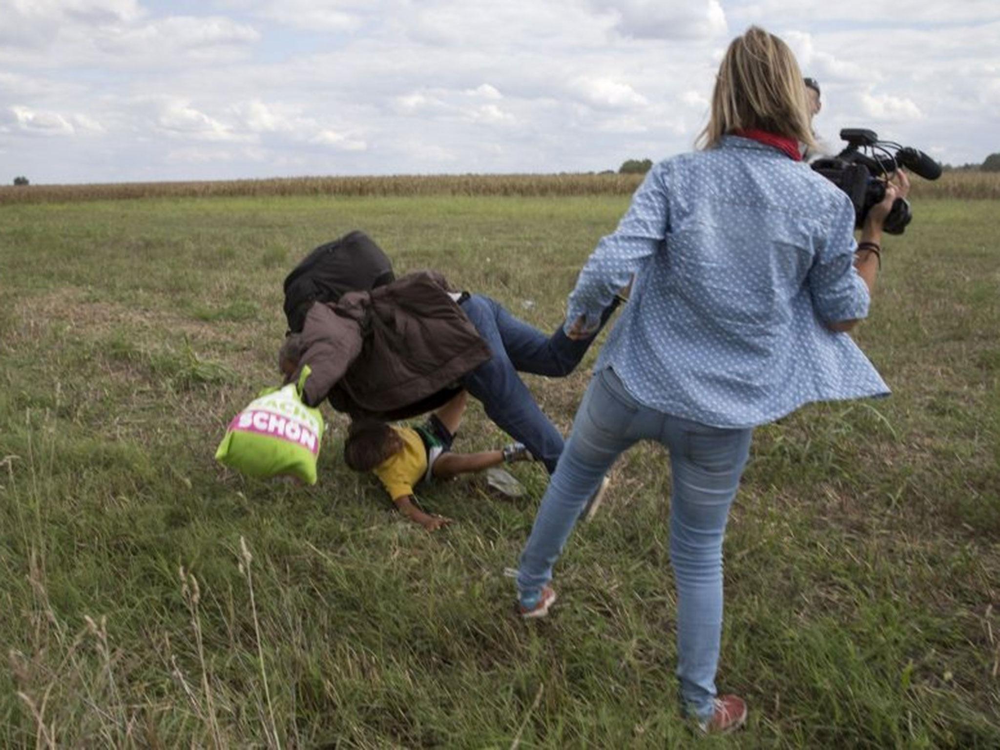 Petra László was caught on camera kicking and tripping up refugees
