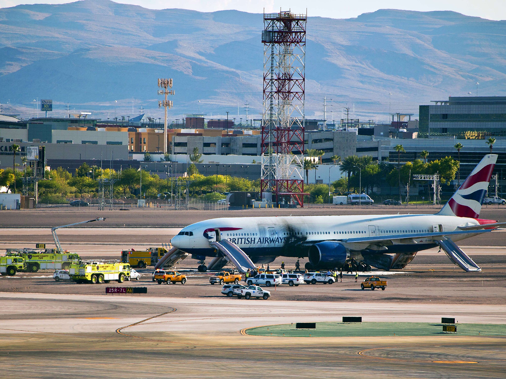 A British Airways jet caught fire at Las Vegas' airport, prompting the crew to abort takeoff and evacuate terrified passengers. Seven people on board the London-bound flight were treated for minor injuries