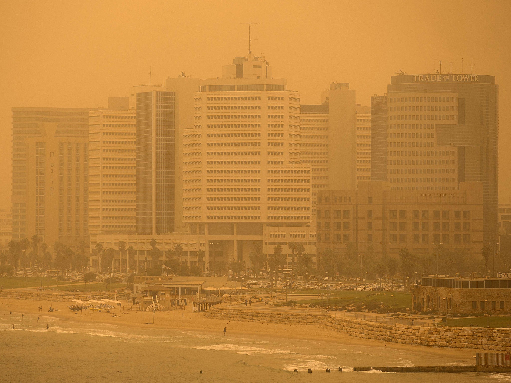 A beach in the city of Tel Aviv during a sandstorm
