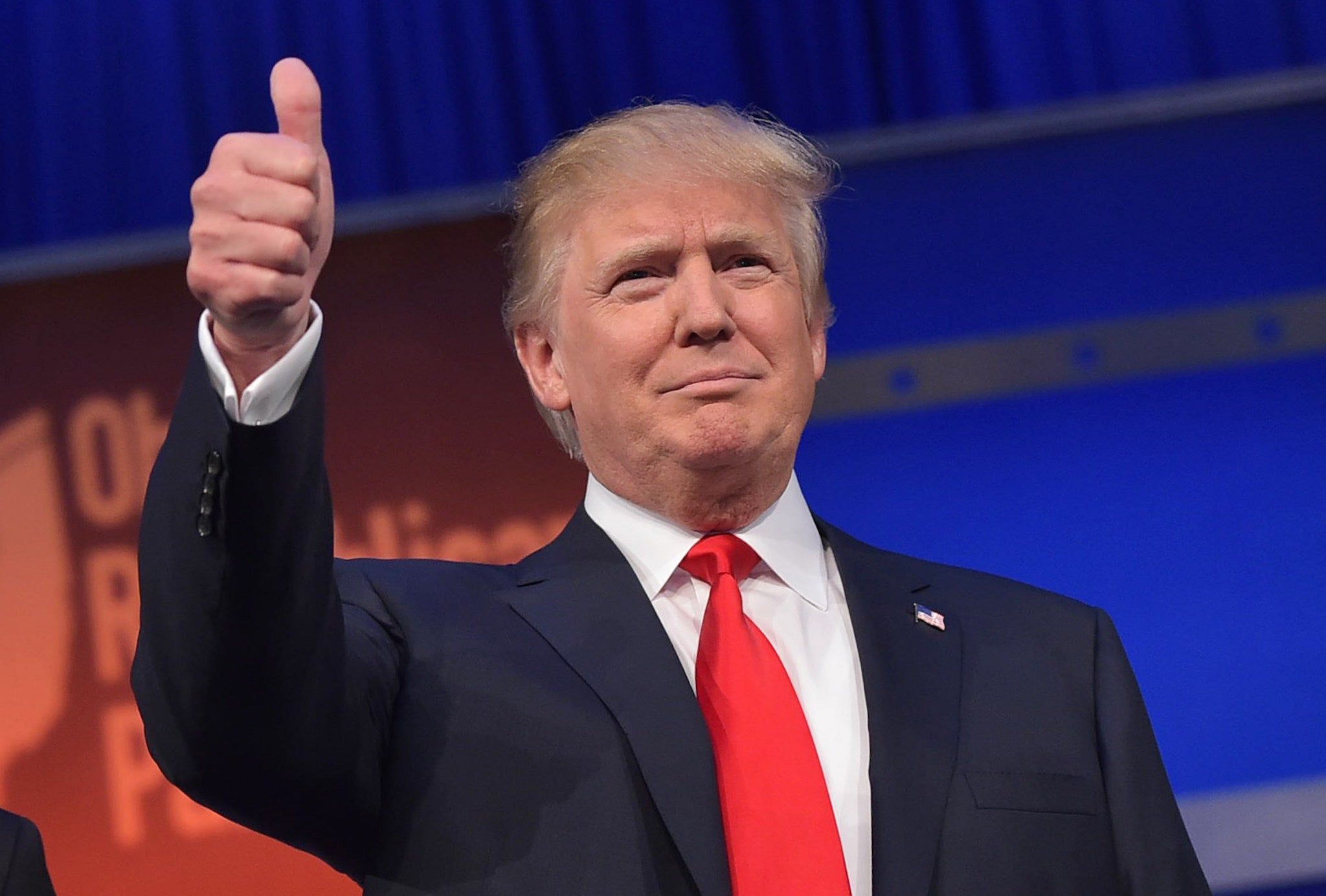 Donald Trump gives a thumbs-up during Republican presidential debate. (Mandel Ngan/AFP/Getty Images)