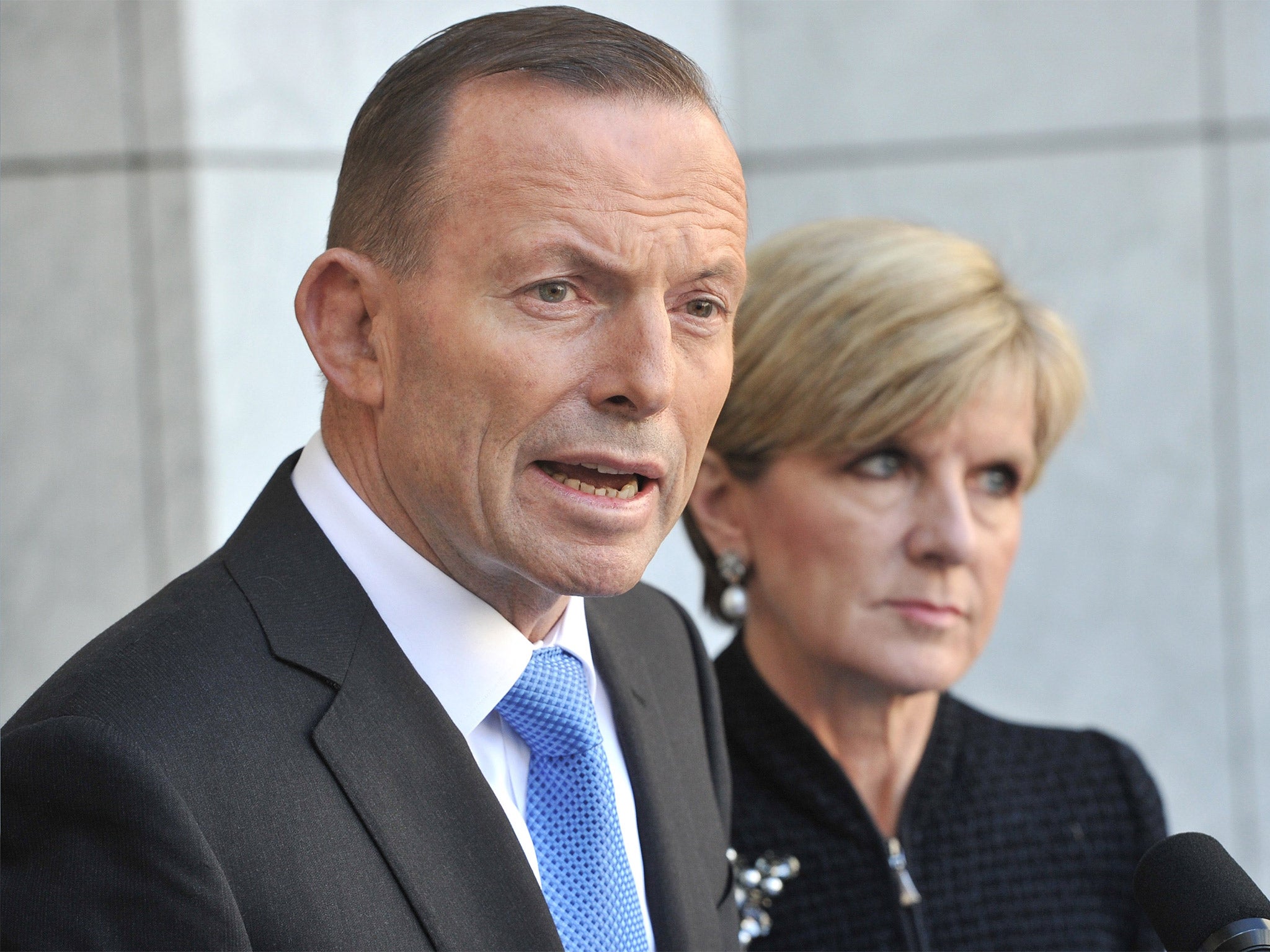 Australian Prime Minister Tony Abbott speaks to the media outside Parliament House in Canberra