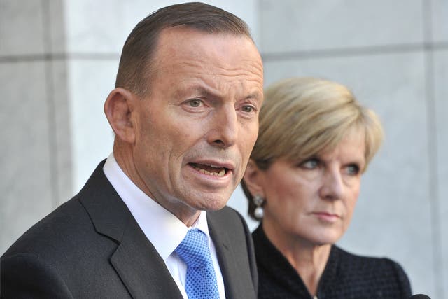 Australian Prime Minister Tony Abbott speaks to the media outside Parliament House in Canberra 