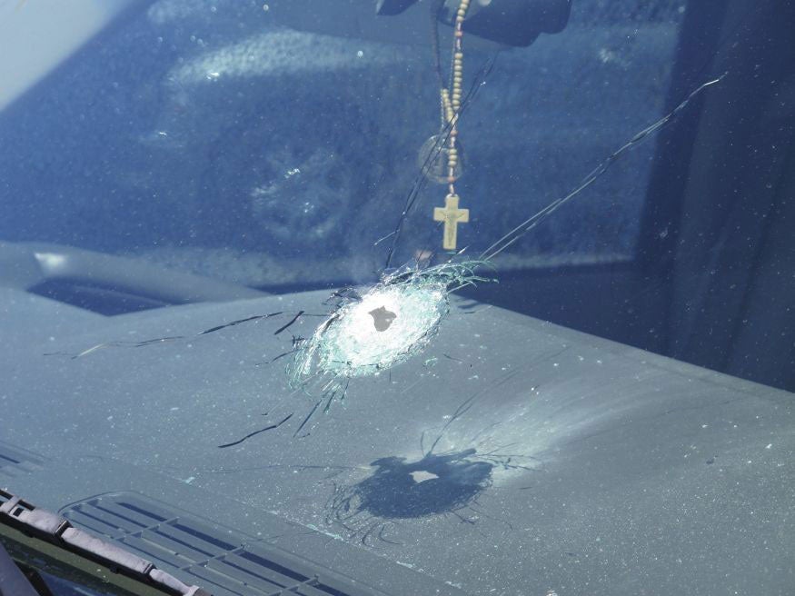 A bullet went through the windscreen of one of the cars hit on the Interstate 10 through Phoenix