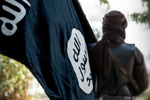 <p>An image from Isis’s Dabiq propaganda magazine</p>