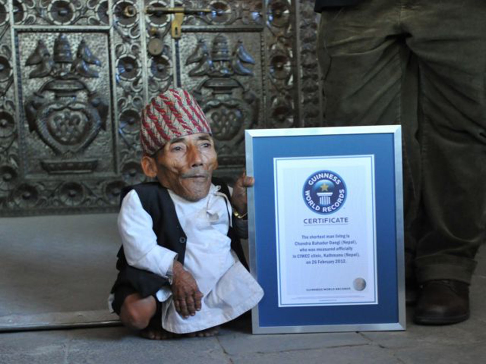 Dangi with his Guinness certificate