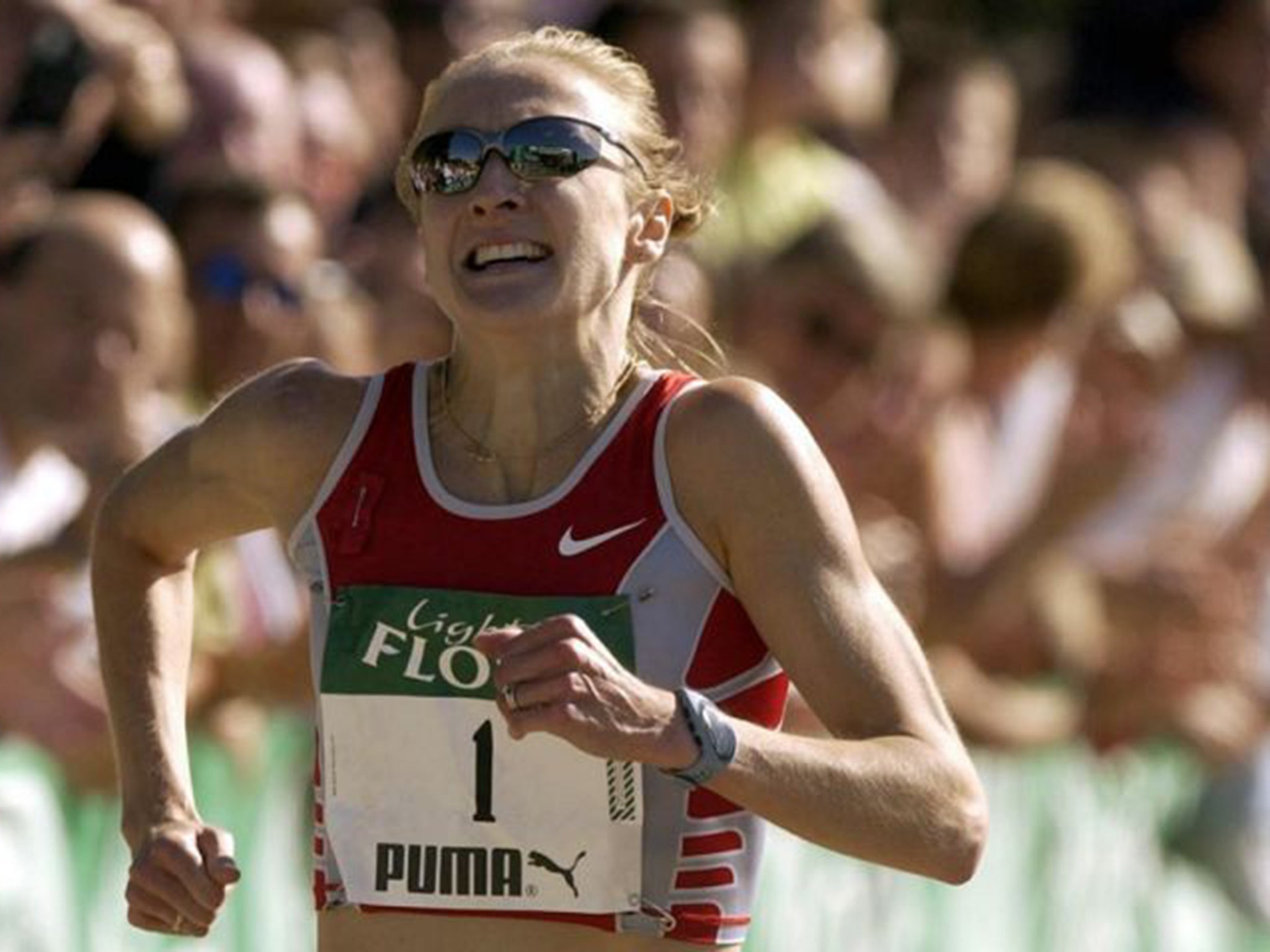 Paula Radcliffe sets a new world record in 2003 as she crosses the finish line at the Flora Light Women's Challenge in Hyde Park, London