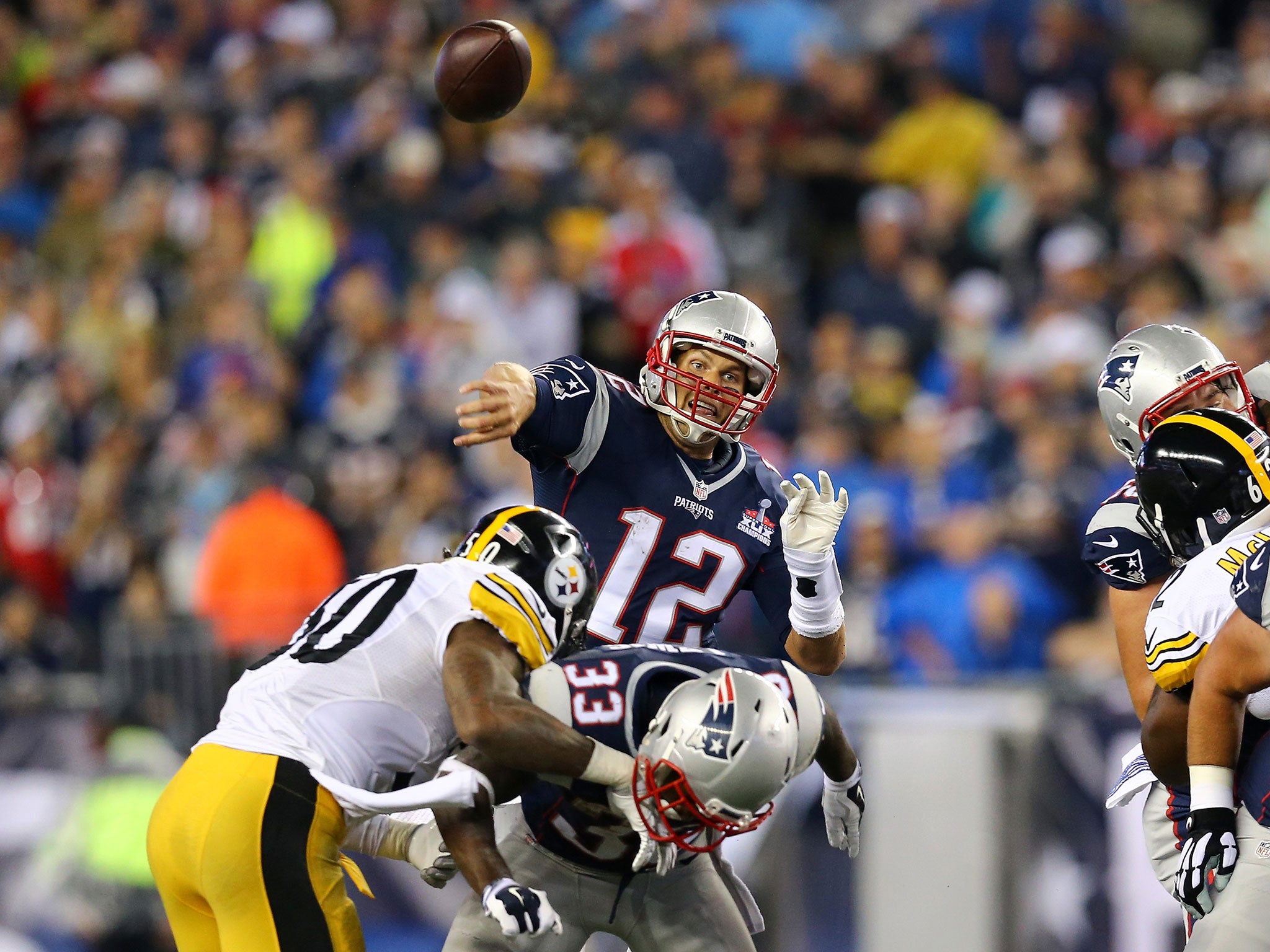 New England Patriots quarter-back Tom Brady throws a pass