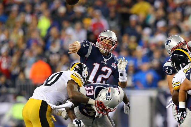 New England Patriots quarter-back Tom Brady throws a pass