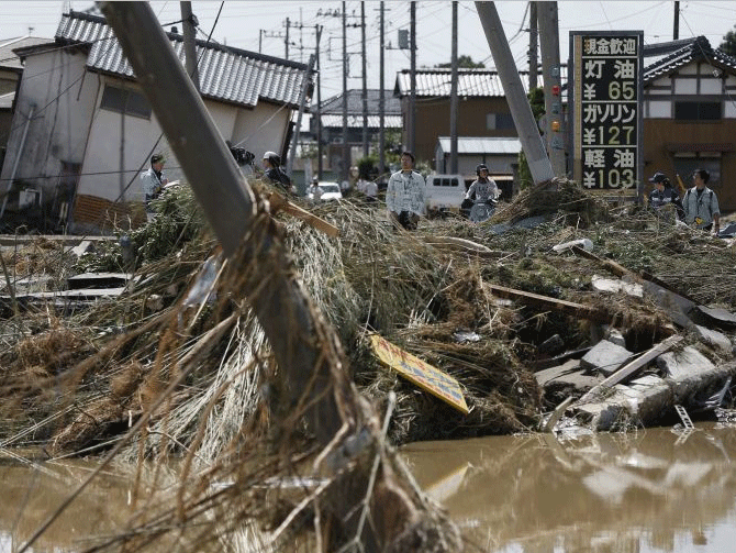 Destroyed street and electric power poles in Joso, Ibaraki prefecture, Japan