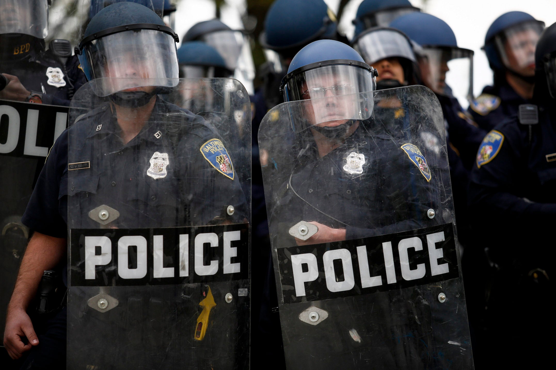Baltimore Police officers face protesters in Baltimore, Maryland.