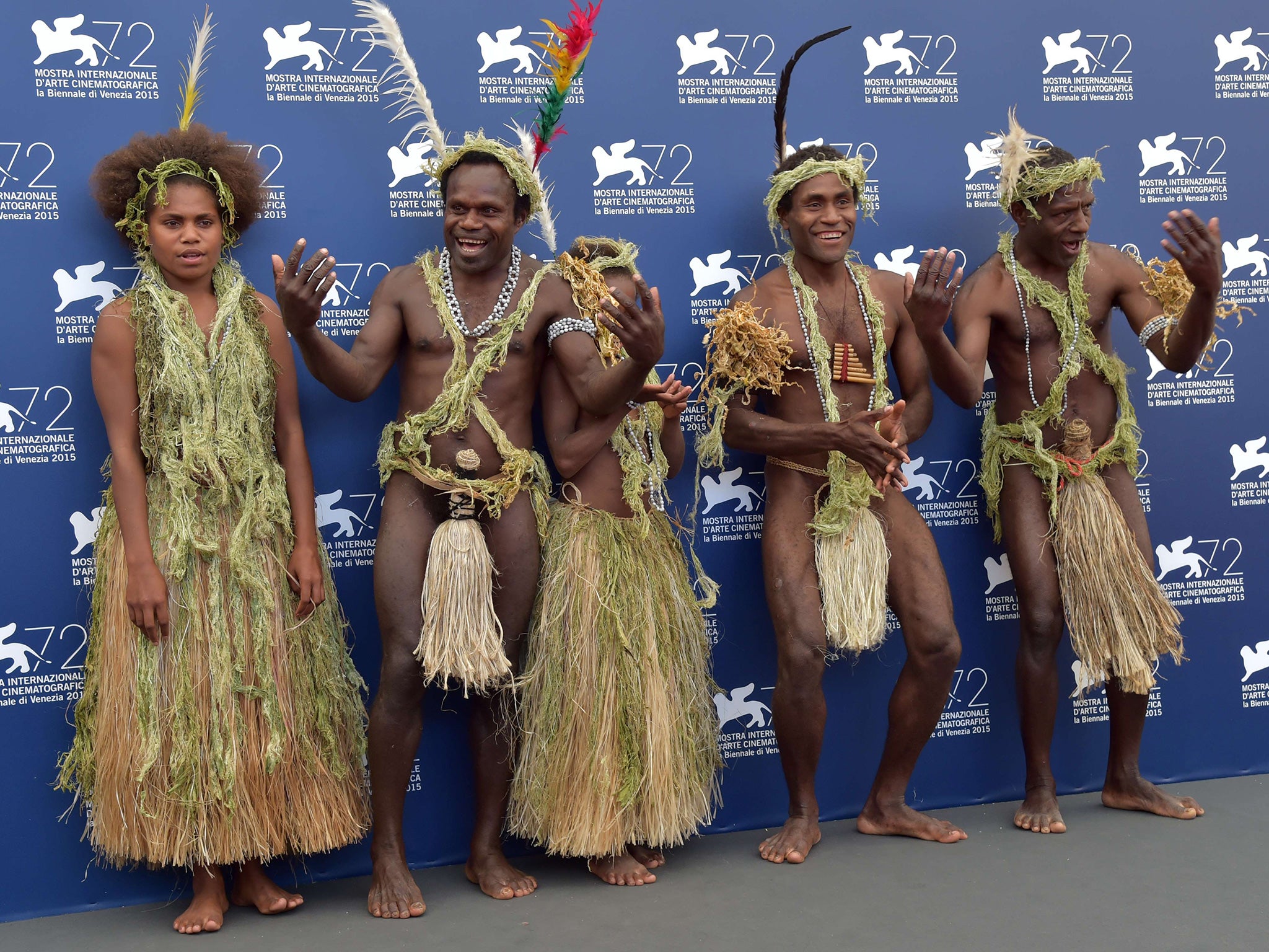 Members of the tribe from Vanuatu’s remote Tanna island pose for the media before the screening of their film at the Venice Film Festival