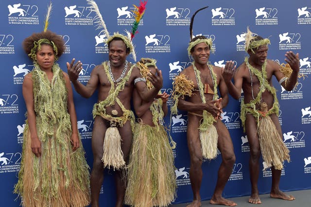 Members of the tribe from Vanuatu’s remote Tanna island pose for the media before the screening of their film at the Venice Film Festival