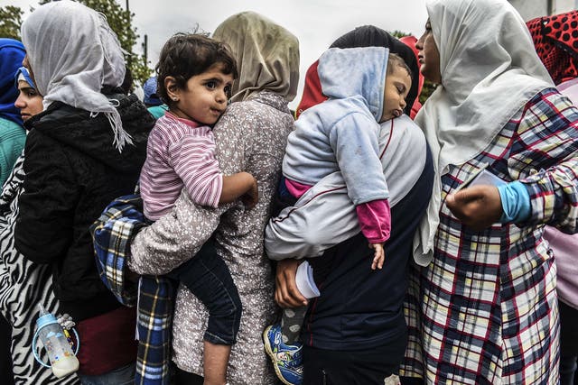 Refugees at a registration camp in Serbia’s most southerly town, Presevo, yesterday. A record 5,000 people arrived at Serbia’s border with Hungary between Thursday and yesterday. Around 3,000 of them have already entered Hungary and are on their way to Ge