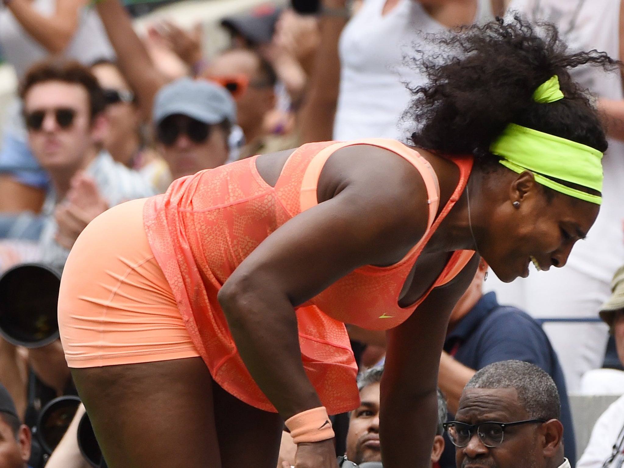 Serena Williams of the US chases down but misses a return to Roberta Vinci